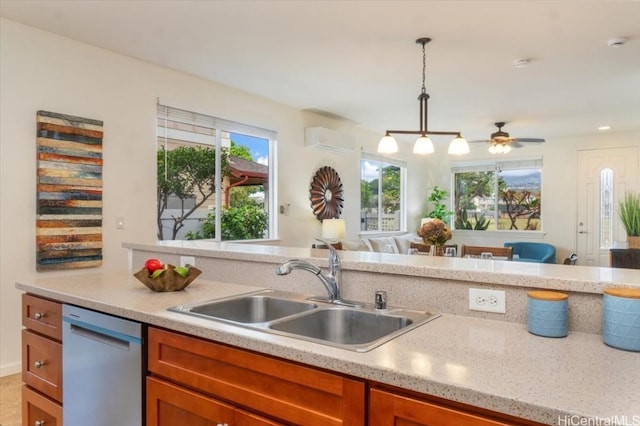 kitchen featuring a wall mounted air conditioner, a sink, open floor plan, brown cabinetry, and dishwasher