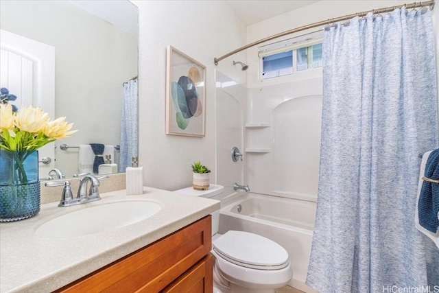 full bathroom with toilet, vanity, and shower / bath combo