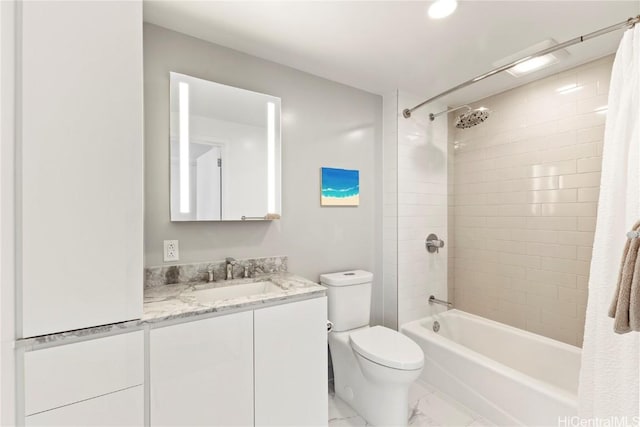 full bathroom featuring toilet, marble finish floor, shower / bathtub combination with curtain, and vanity