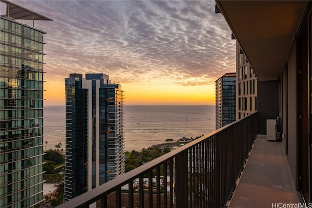 balcony at dusk with a water view