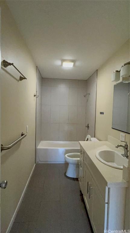 full bathroom with vanity, toilet, and tiled shower / bath combo