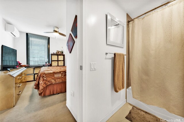 bedroom with light colored carpet and a wall mounted AC