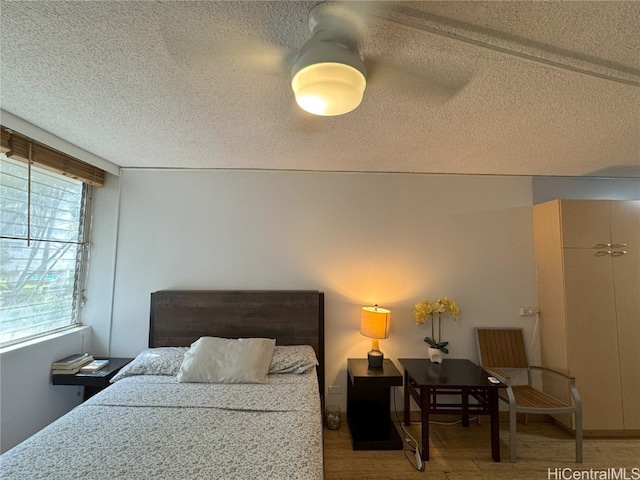 bedroom with a textured ceiling