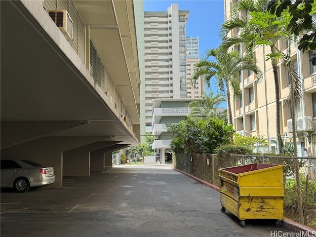 view of road with a view of city and aphalt driveway