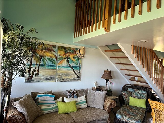 living room featuring stairs