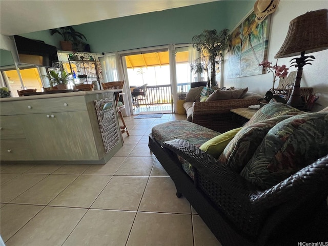 living area featuring light tile patterned flooring