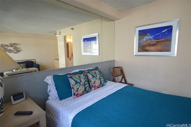 bedroom with a textured ceiling