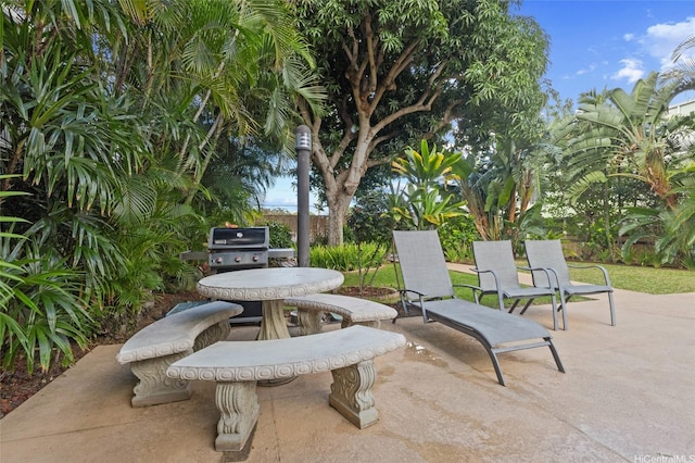 1617 Keeaumoku St Unit 1405, Honolulu, HI 96822 - view of patio / terrace featuring outdoor dining space and a grill