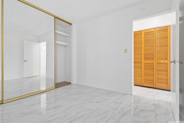 1617 Keeaumoku St Unit 1405, Honolulu, HI 96822 - unfurnished bedroom featuring marble finish floors