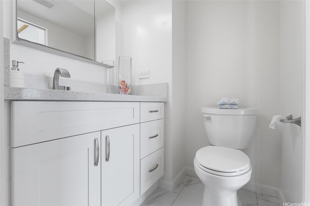 1617 Keeaumoku St Unit 1405, Honolulu, HI 96822 - bathroom featuring vanity and marble finish floors