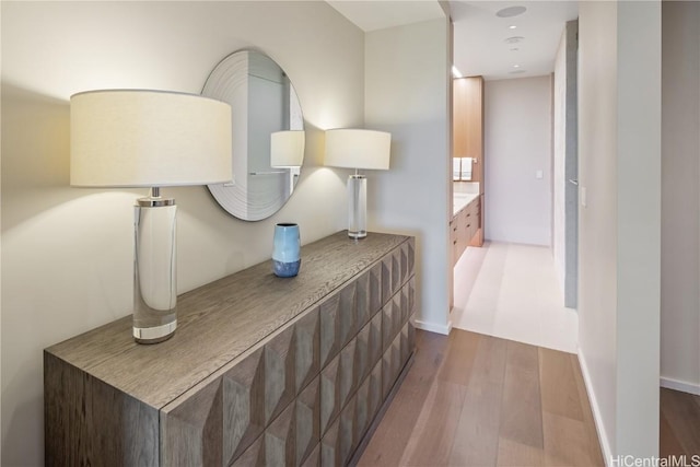 hallway featuring dark hardwood / wood-style floors