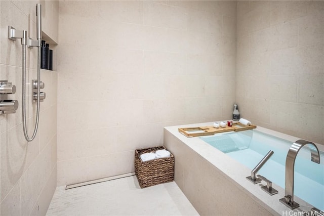 bathroom with tile walls