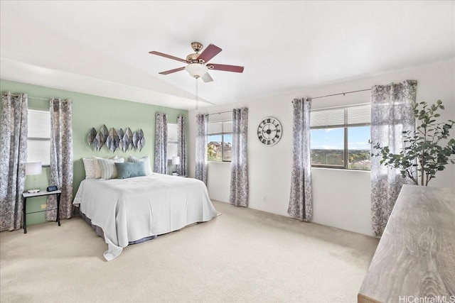 bedroom featuring carpet floors, a ceiling fan, and vaulted ceiling