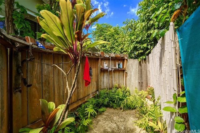 view of yard with fence