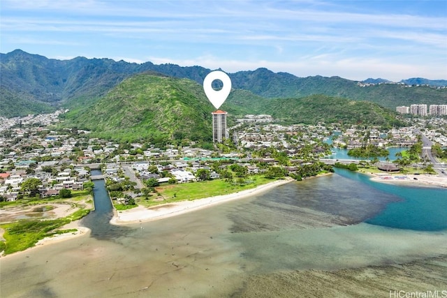 surrounding community featuring a water and mountain view