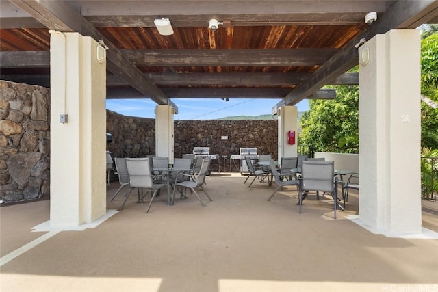 view of patio featuring a grill and outdoor dining area