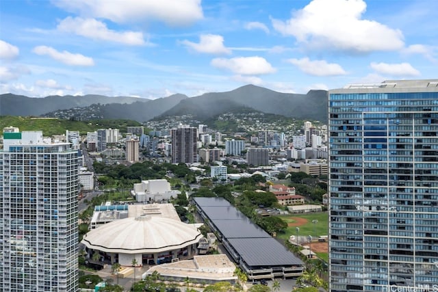 exterior space with a mountain view and a city view