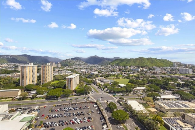 aerial view with a view of city and a mountain view