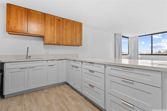 55 S Kukui St Unit D2614, Honolulu, HI 96813 - kitchen with light stone countertops and a peninsula