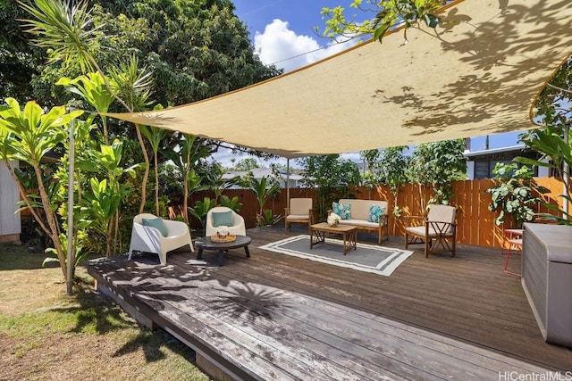 deck featuring fence and an outdoor living space