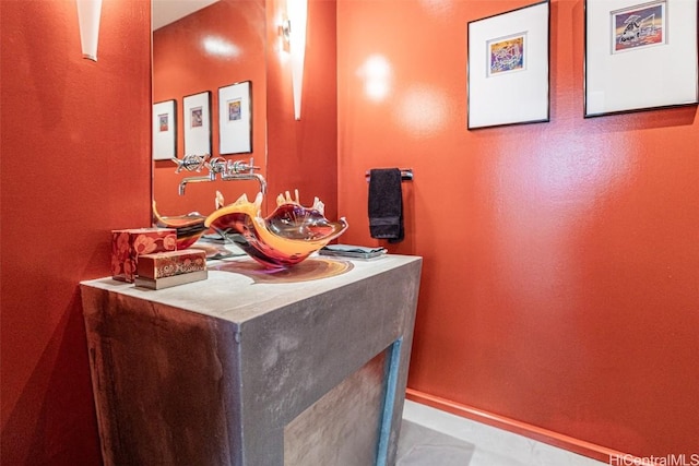 bathroom featuring baseboards