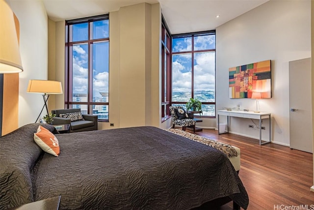 bedroom with wood finished floors