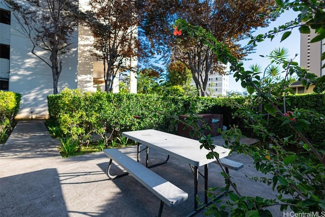 view of patio featuring outdoor dining area