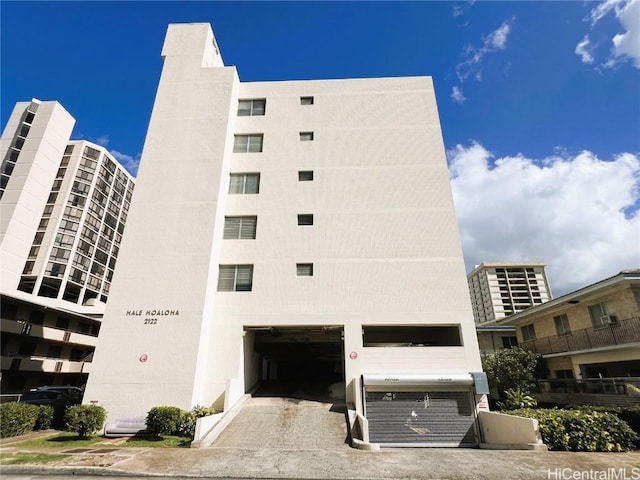 view of building exterior featuring central air condition unit