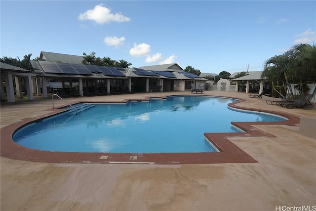 community pool featuring a patio