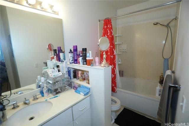 full bath featuring shower / tub combo, vanity, and toilet