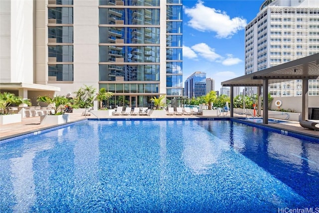 view of swimming pool with a patio