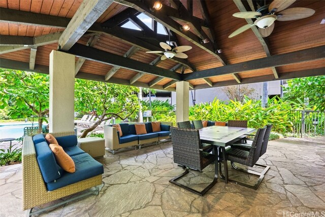 view of patio / terrace featuring ceiling fan, outdoor lounge area, and a gazebo