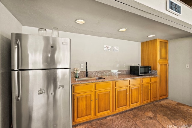 kitchen with stainless steel appliances and sink