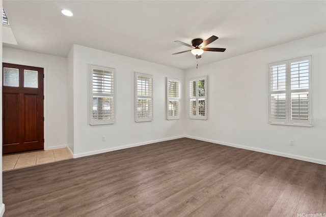 entryway with ceiling fan, baseboards, recessed lighting, and light wood-style floors