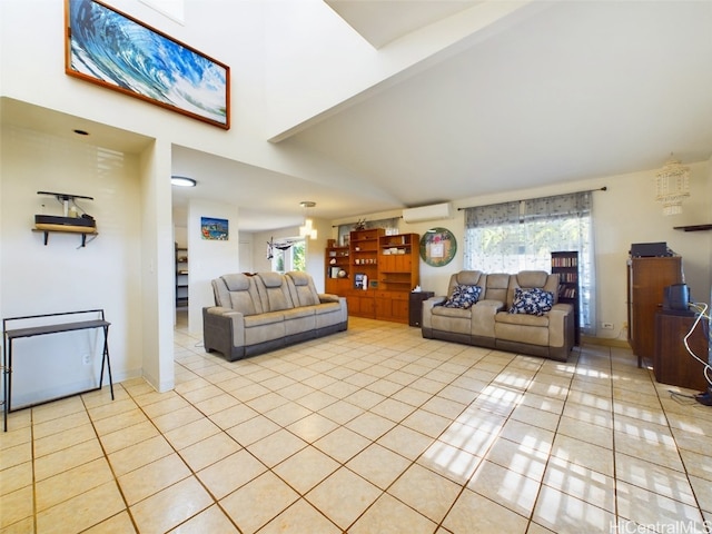 tiled living room featuring an AC wall unit and a healthy amount of sunlight