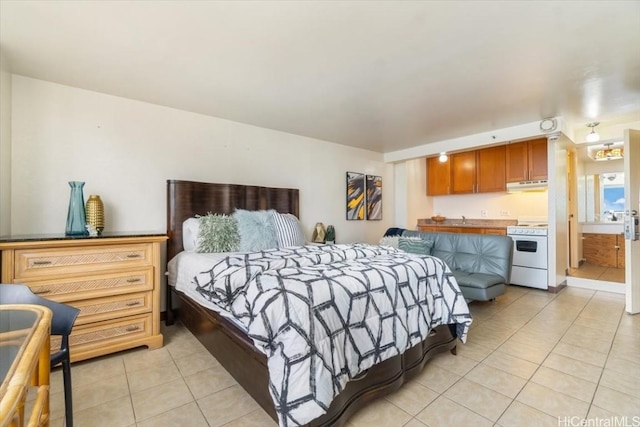 bedroom featuring light tile patterned floors