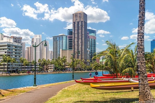 view of home's community featuring a water view and a city view