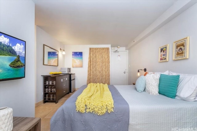 bedroom featuring light tile patterned floors