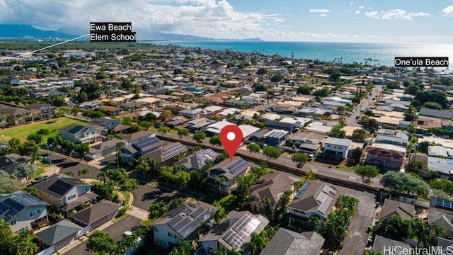 birds eye view of property featuring a water view and a residential view