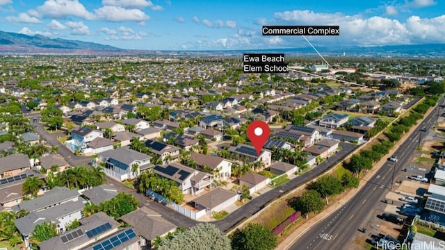 birds eye view of property featuring a residential view and a mountain view