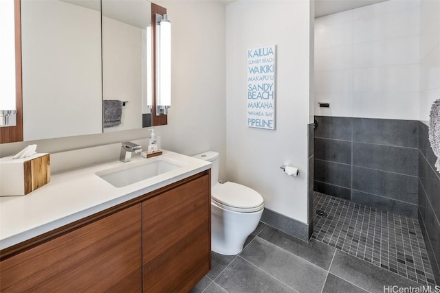 full bath with toilet, tile patterned floors, a walk in shower, and vanity