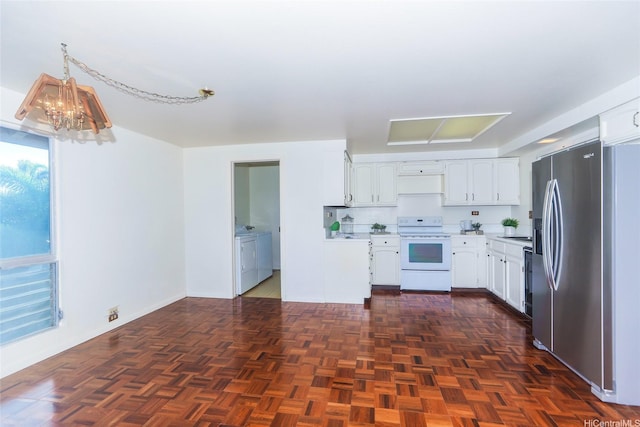 kitchen featuring electric range, light countertops, washing machine and dryer, white cabinetry, and stainless steel refrigerator with ice dispenser