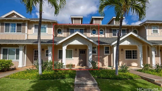 townhome / multi-family property featuring board and batten siding