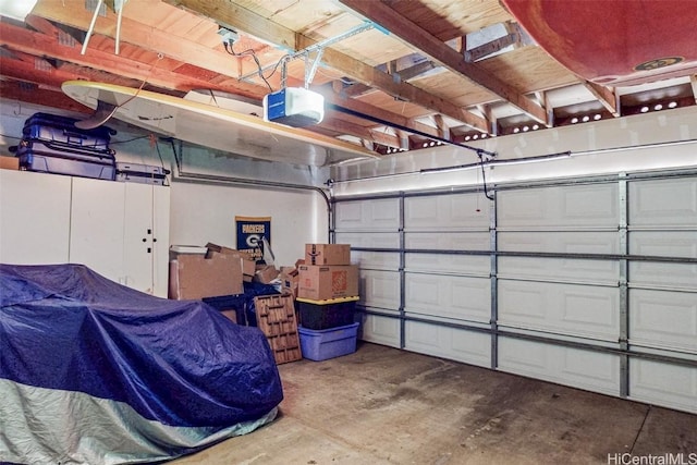 garage featuring a garage door opener