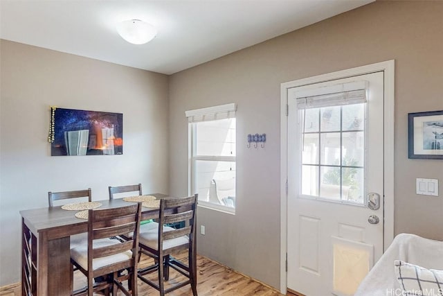 dining room featuring light wood finished floors