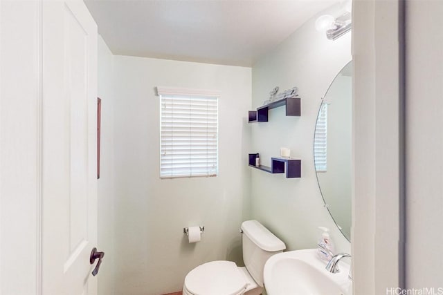 bathroom with a sink and toilet