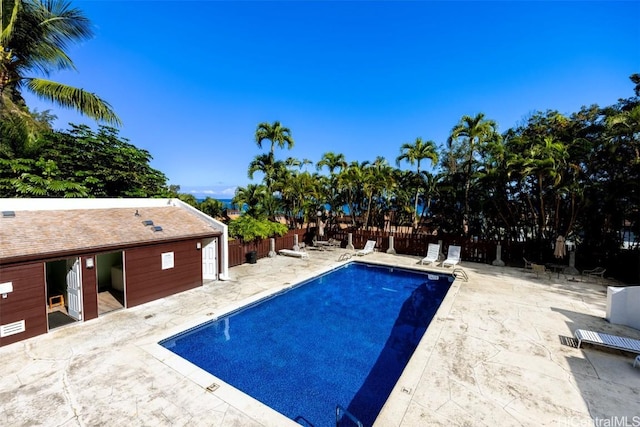 view of swimming pool with a patio