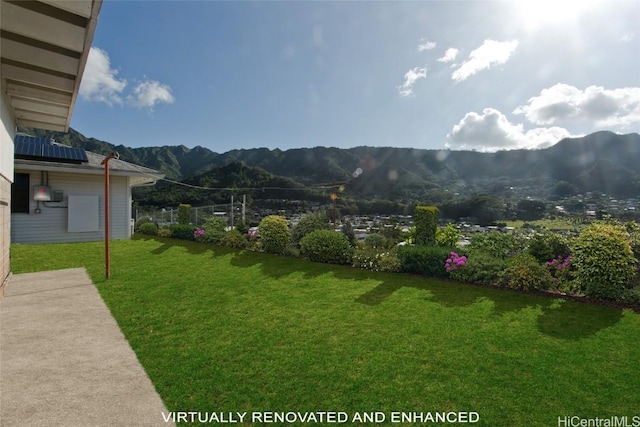 view of yard with a mountain view