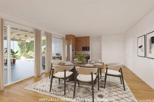 dining room with light wood-style flooring