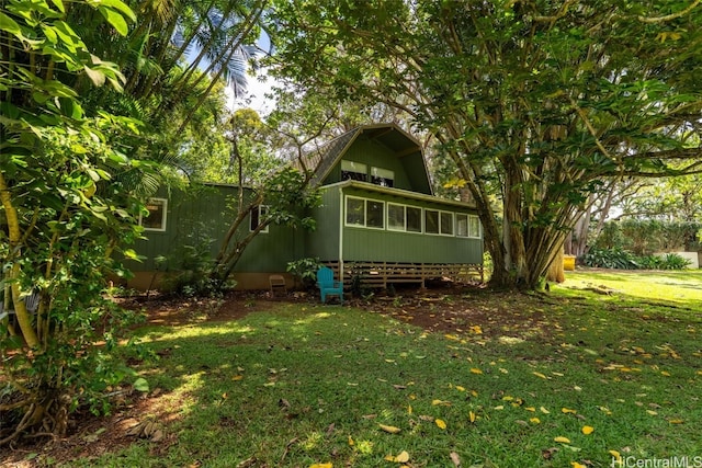 view of yard with a sunroom